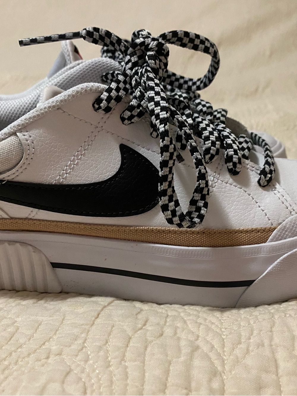 Nike White Sneakers with Black Swoosh and Checkered Laces